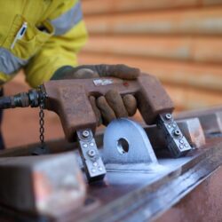 Ndt,Technician,Wearing,Safety,Glove,Spraying,Black,Paint,While,Conducting